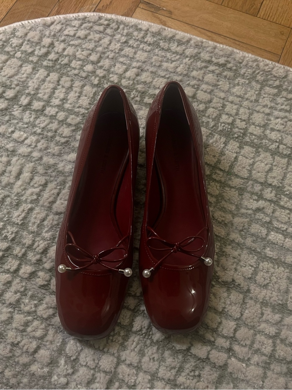 Charles & Keith Burgundy Patent Ballet Low Pumps with Bow and Pearl Detail